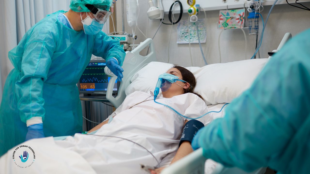 Doctors and nurses closely monitoring a liver transplant patient in the ICU with advanced medical equipment.